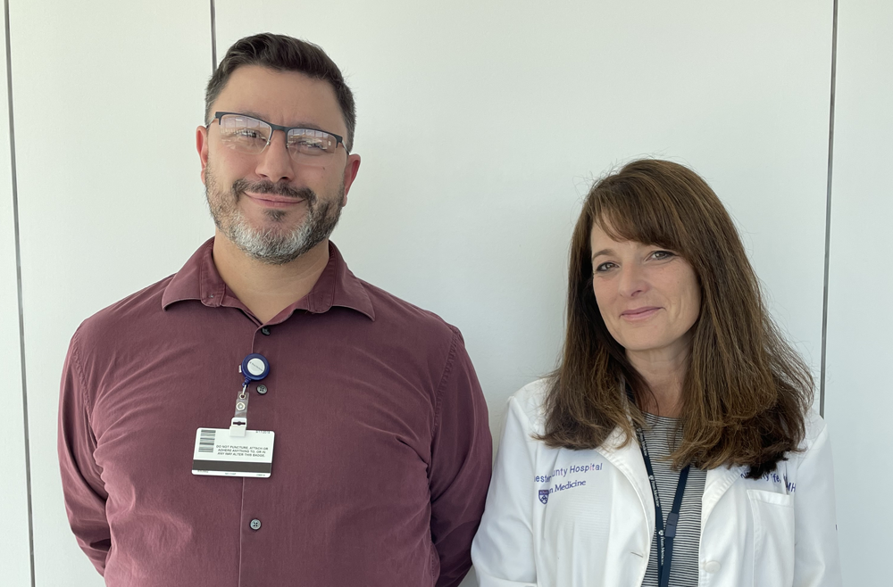 Two healthcare professionals stand side by side